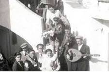 On the steps of the Gerasimos Lahanas household,Panagiotis Katsoulis on the laouto and Pitsikas on the violin
play for the bride, his daughter  and groom.
Wedding was of Panayiotis Fardoulis and Panayiota Lahanas May 15th 1954. Attended by my Uncle Thodore Gavrilys in Logothetianica.