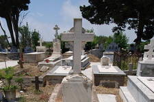 On Cross:

Nikolaou Kasimati
6 December 1912

On Plaque:
Stavoula I. Koronaios
d. 8 December, 1918

Ioannis K. Koronaios
d. 6 January, 1941

On grave:

Aikaterini N. I. Kasimati
d. 4 December, 1938 ?
age 60

Eleni B. 
dates and names are difficult to read - please help identify...