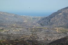 Burnt out valley between Mitata, ...