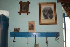 on the wall of the Koroneos <i>patriko spitti</i>, Kritheryianika, Karavas.

Theothosios, <i>Belos</i> Koroneos, a very industrious & entrepreneurial man, is depicted in the right hand side photograph, with second wife, Stamatoula.