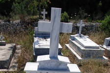 Here lies Konstantinos And. Trifillis and Kyrani Kon. Trifilli

also: 
Fardoulis H. Kalogridis
Konstantinos 1940-1984
Fardouli H. Kalogridi
Vasiliki 1899-1980