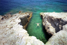 nice little swimming place at the cave of agios nicholas near and just below the church, the cave has a little beach inside the cave, has very clear water ,take your snorkles and have fun......