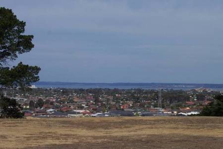 Looking South, from the front entrance, across the city of Geelong to the sea. - 100_1243