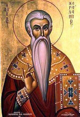 His Grace, Bishop Seraphim, distributing the holy bread - Ayios Haralambos