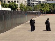 The Metropoliti of Kythera, and father Petros were fascinated by the Welcome Wall at Darling Harbour 