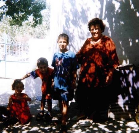 Evangalia (Tzortzo)Poulos (nee, Koroneos), with the children of Gina Kalokerinos, of Greystanes, Sydney, and later Holland. 