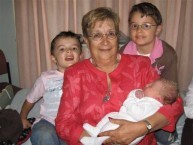 Proud grandmother with her grandsons. 