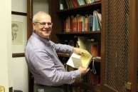 Takis Efstathiou viewing books by Lafcadio Hearn at Tulane University 