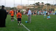 Peter Magiros testing his soccer skills on the stadium he built in Livathi, Kythera 