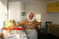 Stavroula Magoula of Perlegianika offering some tomatoes 