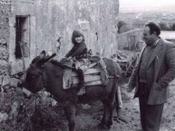 Rebecca on a donkey and Valerios - January 1983 