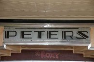 Peters sign revealed. Above the entrance way to the Roxy cafe, Bingara 