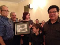 The Smiles family presented the Calokerinos family with a photograph of the original owners 