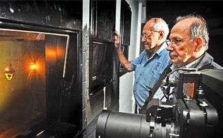 Cinema is worth the wait - Spiro and Angelo Notaras look out into one of two 160-seat cinemas at the Saraton Theatre complex.