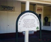 Cassimatis General Store, Muttaburra. Plaque outside the store. 