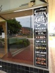 Erected Signage to the right, on the north facing Cafe frontage at the Roxy 