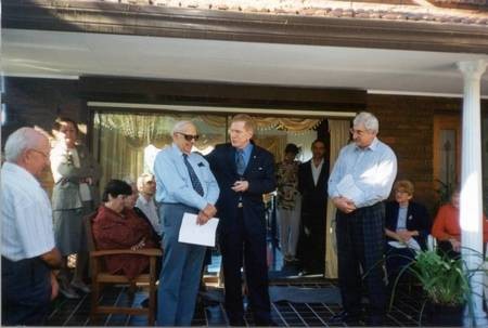 James Coroneos, being honoured by Justice Kirby; Judge, High Court of Australia. 