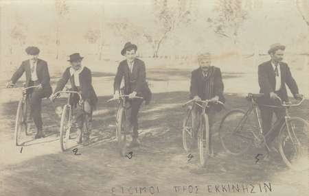 Bikeriders mounted on their bikes - original photograph with inscription across the bottom 