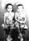 Two little girls with bows 
