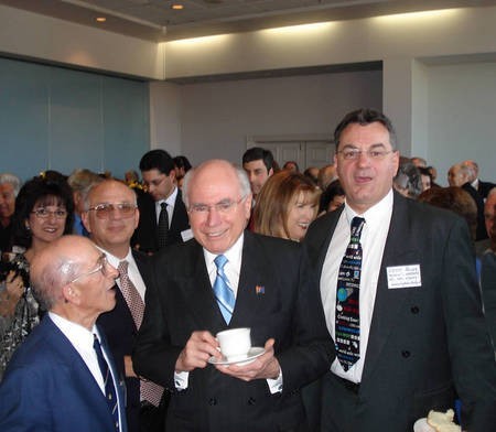 Prime Minister of Australia, John Howard, with Secretary of the Kytherian Association of Australia, George Poulos. 