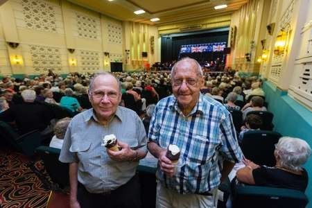 Spiro and Angelo Notaras eating ice cream at “ The Proms” concert the Saraton Theatre . 