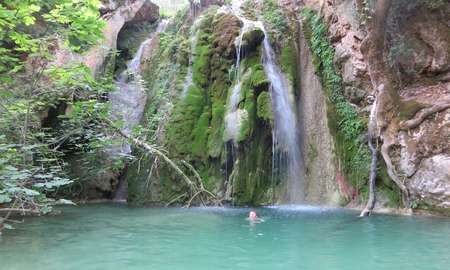 Jemima swimming at the second waterfall down from Mylopotamos 
