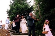 Maria and her father Peter walking to the church 