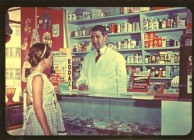 Bretos Margetis serving in Redfern Pharmacy. 