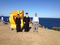 The Metropoliti of Kythera and Father Petros in front of one of the many sculptures 