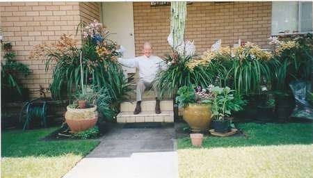 Emanuel Casimatis. Sitting on the front doorstep to his house 