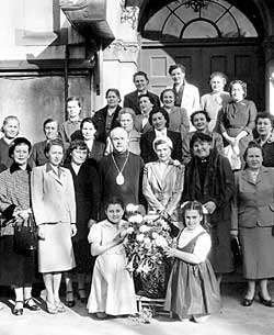 Greeks in the Far Orient - Greek and Russian parishioners pose with their bishop in front of a Greek-Orthodox church in Tokyo
