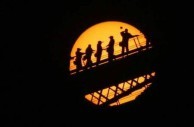 "Its a pretty big turnout for a dot" ...tourists climbing the Harbour Bridge Jun 8, 2004, as Venus passes across the face of the sun. 