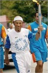 Peter Clentzos running with the Olympic torch, 2004, aged 95. 
